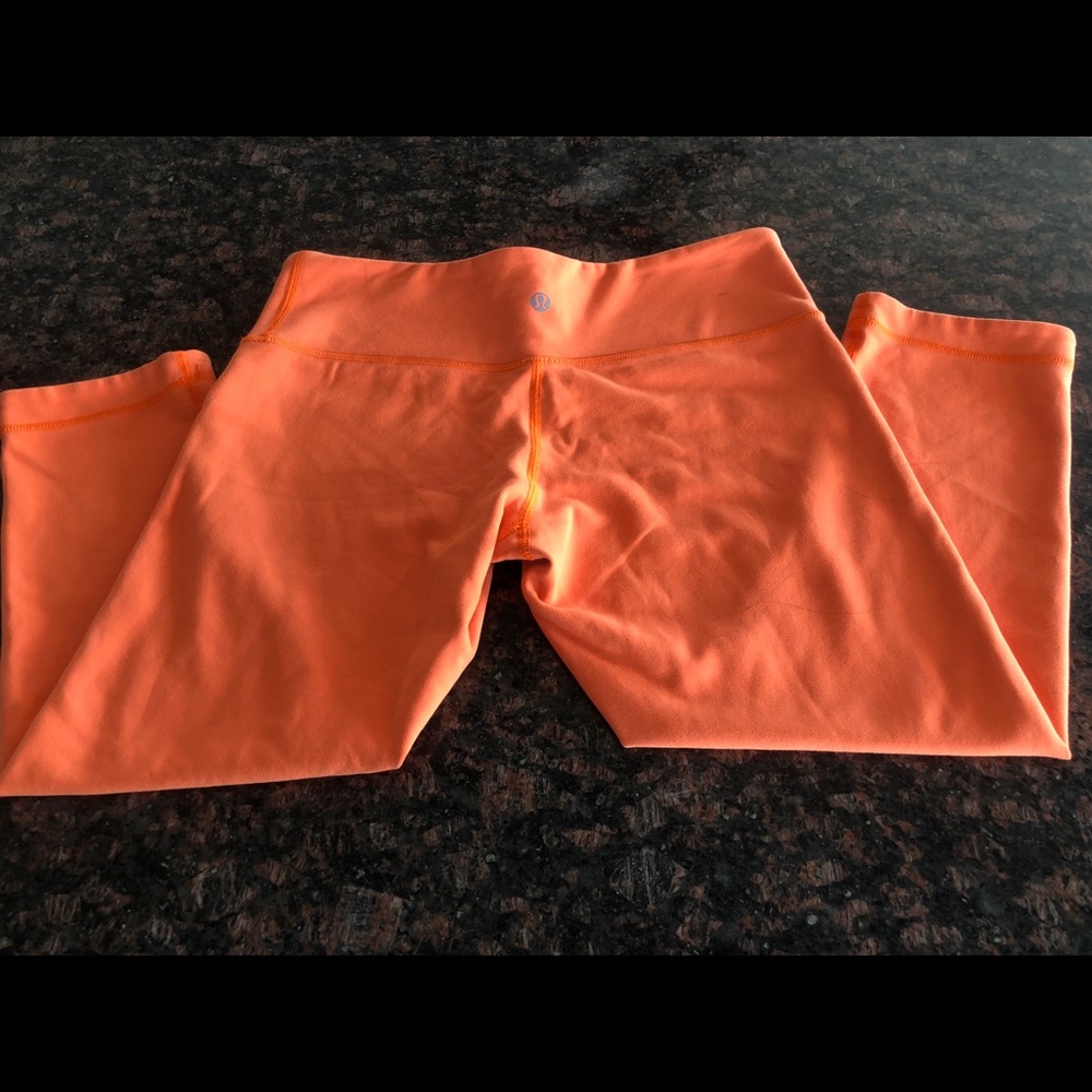 Size 6 orange Lululemon Capris